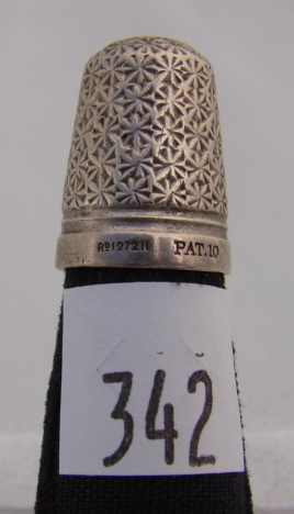 Appraisal: Thimble with relief design