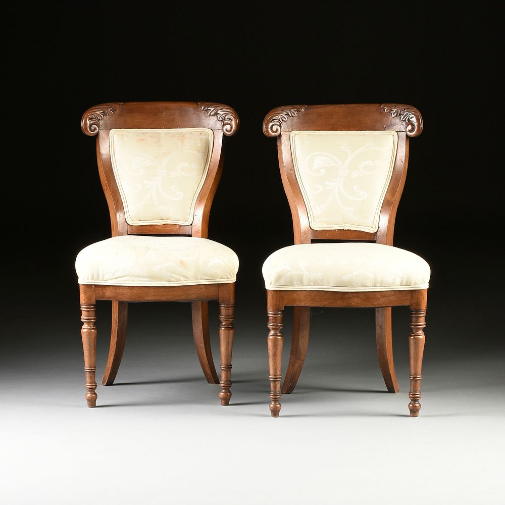 Appraisal: A SET OF THREE LOUIS PHILIPPE CARVED WALNUT SIDE CHAIRS