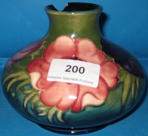 Appraisal: Moorcroft Squat vase decorated in Anenome on green ground Height