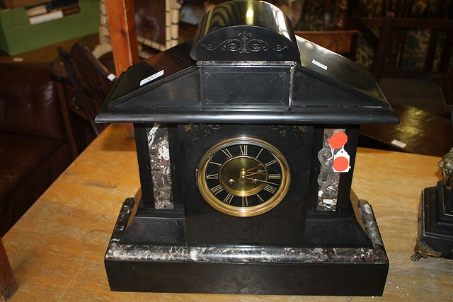 Appraisal: A LARGE VICTORIAN BLACK SLATE MANTEL CLOCK with striking French