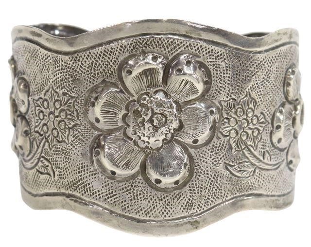 Appraisal: Sterling silver cuff bracelet Mexico textured cuff with repousse floral