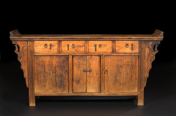 Appraisal: Kuang-Hsu Wrought-Iron-Mounted Carved Elmwood Cabinet in the Ming Dynasty style