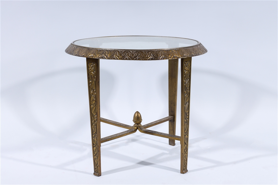 Appraisal: Glass topped antique bronze metal low end table with carved