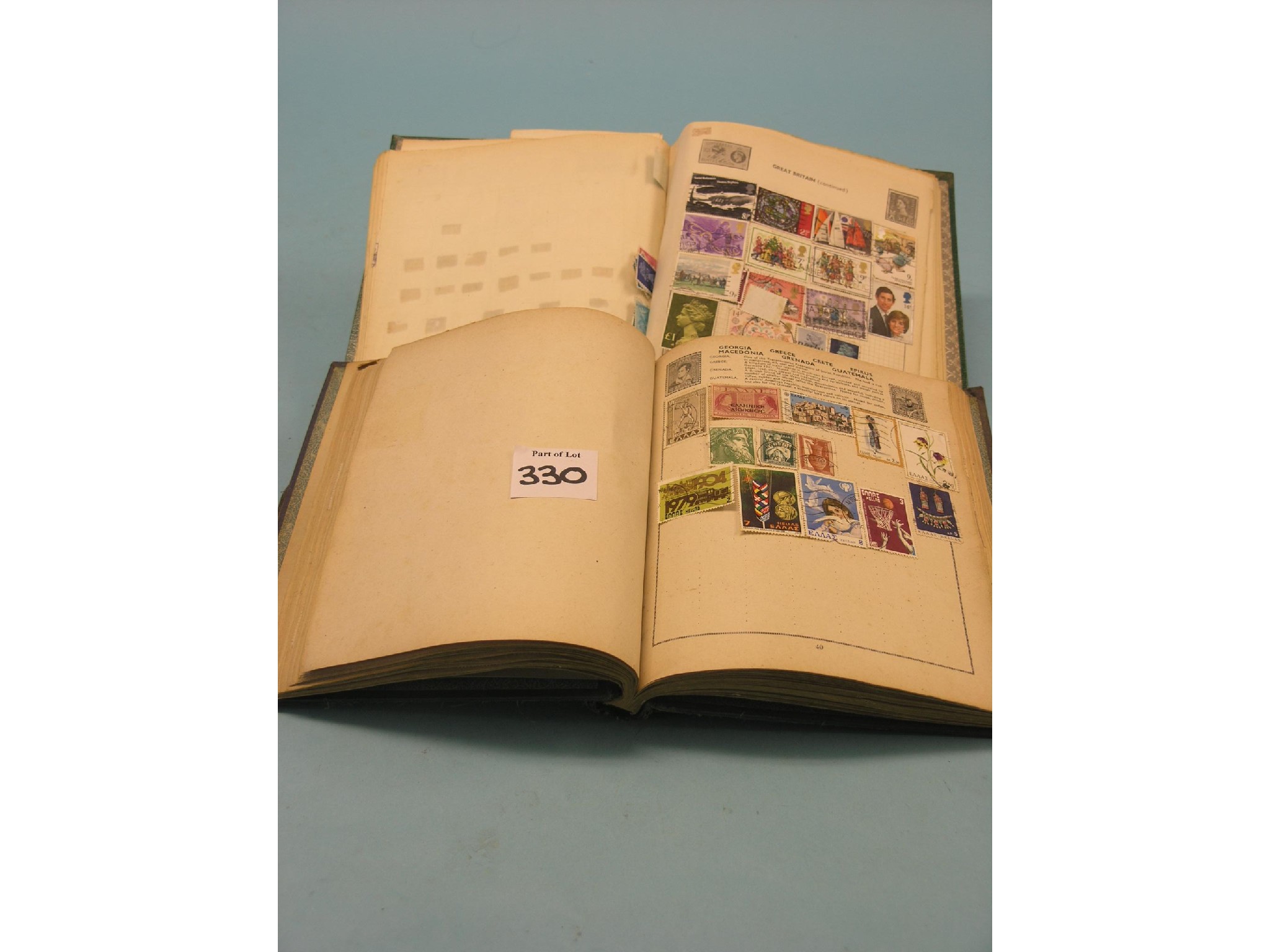 Appraisal: A collection of world stamps contained within two stamp albums