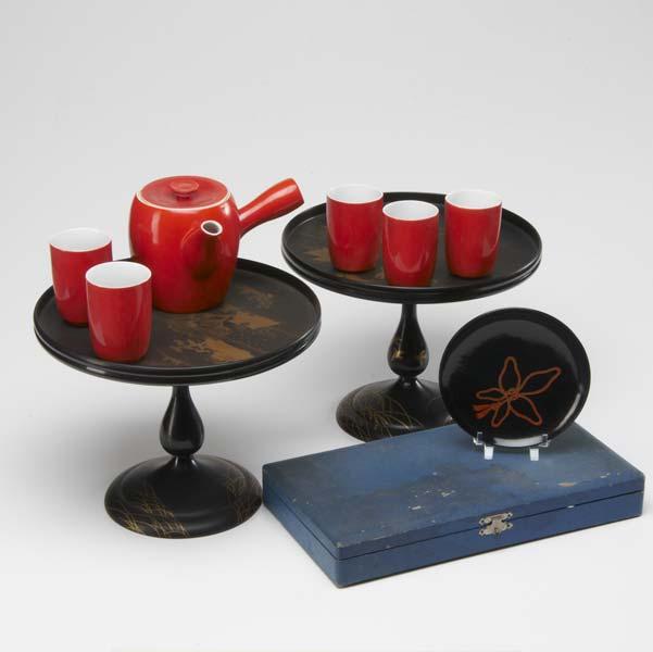 Appraisal: JAPANESE LACQUER AND PORCELAIN Two ceremonial stands with landscape design