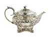 Appraisal: A GEORGE IV TEAPOT of compressed circular form chased with