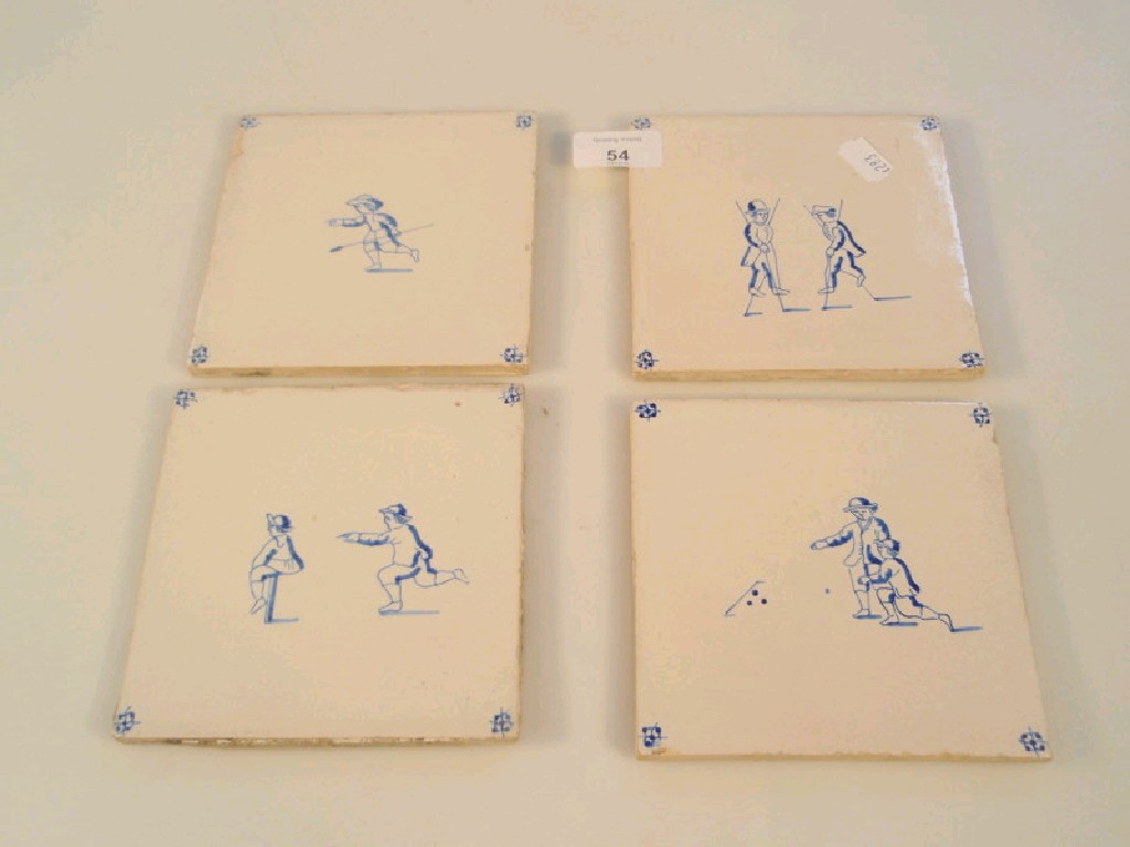 Appraisal: A series of four blue Delft tiles with character figures