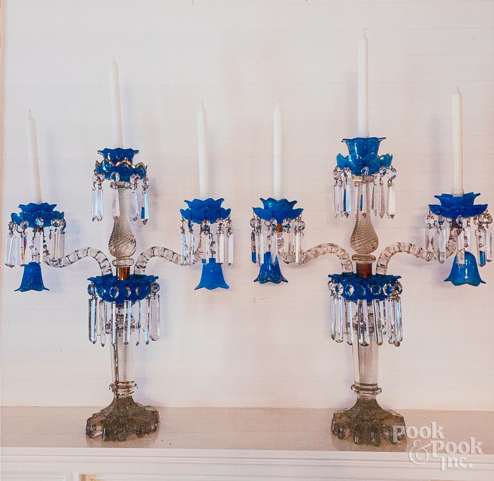 Appraisal: Pair of colorless and cobalt glass candelabra Pr Pair of