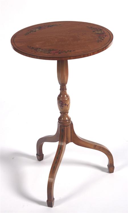 Appraisal: A Sheraton style satin birch wine table the circular top