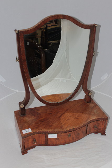 Appraisal: AN TH CENTURY MAHOGANY SERPENTINE FRONTED SHIELD SHAPED DRESSING TABLE