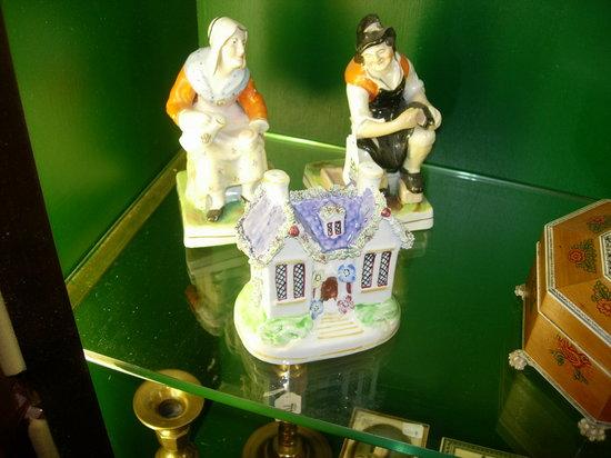 Appraisal: A PAIR OF STAFFORDSHIRE FIGURES Cobbler and his wife high