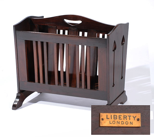 Appraisal: A LIBERTY CO COMPTON MAHOGANY MAGAZINE RACK with angle slatted