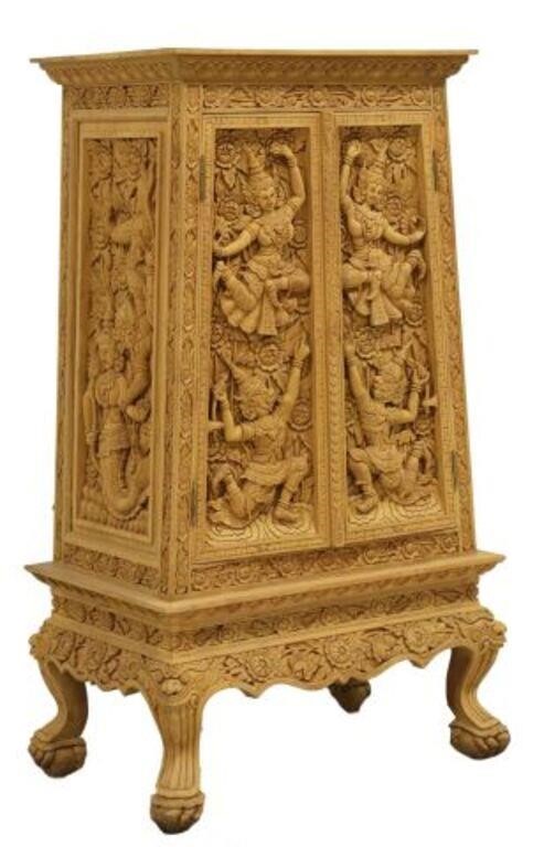 Appraisal: Southeast Asian elaborately carved hardwood cabinet likely Thailand having stepped