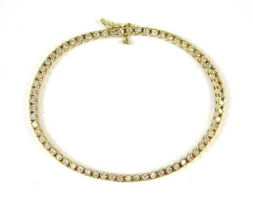 Appraisal: DIAMOND AND FOURTEEN KARAT GOLD TENNIS BRACELET measuring - inches