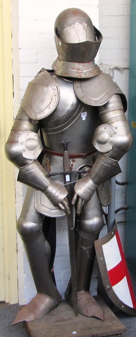 Appraisal: A reproduction suit of armour late th century mounted on