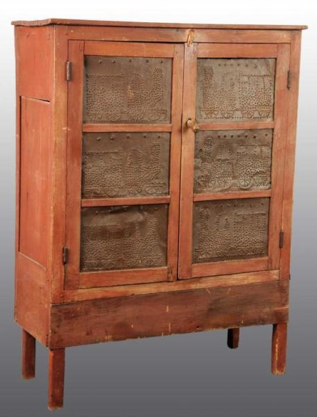 Appraisal: Wooden Primitive Pie Safe Cabinet Description Pine wood with old