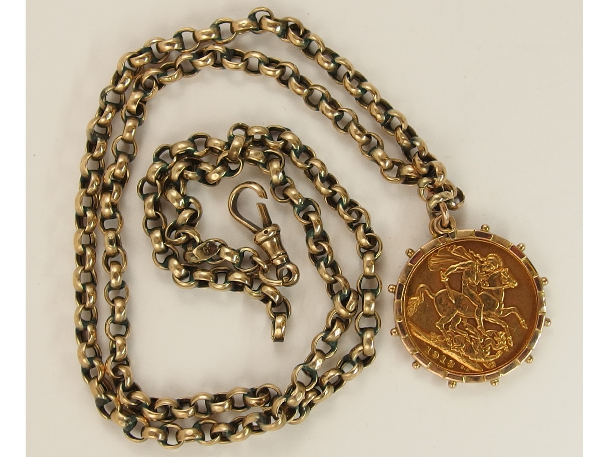 Appraisal: A full gold sovereign in a ct pendant mount with