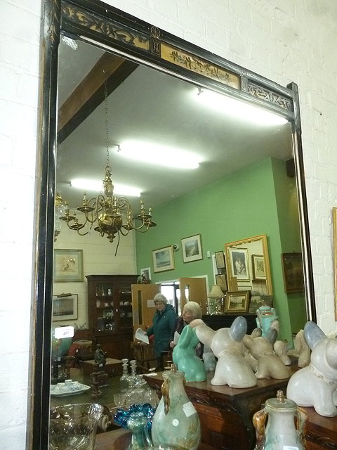 Appraisal: A VICTORIAN AESTHETIC OVERMANTEL MIRROR the rectangular glass with a