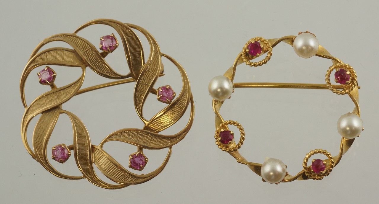 Appraisal: K YG circle pin set with pearls and pale red