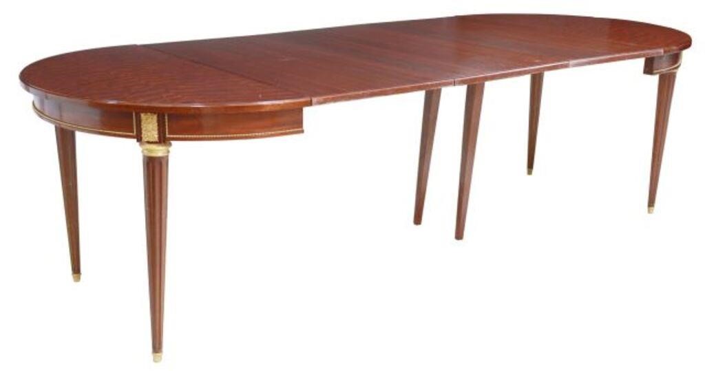 Appraisal: French Louis XVI style mahogany extension table th c figured