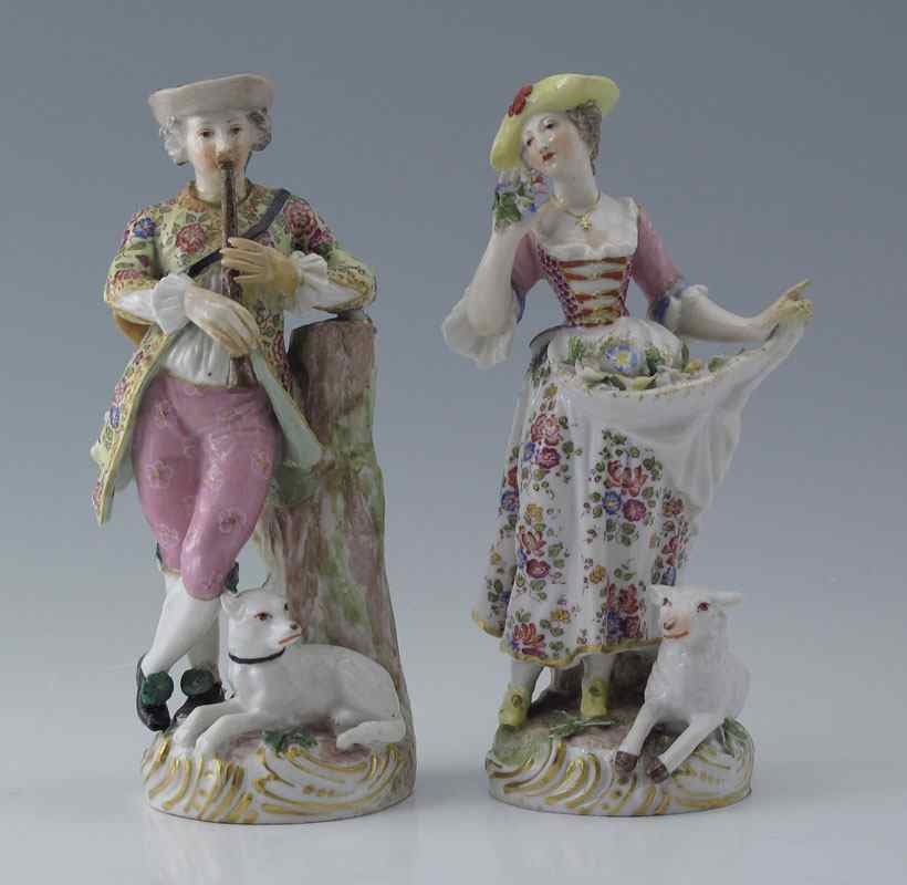 Appraisal: PAIR OF MEISSEN PORCELAIN FIGURINES Romantic couple her with flowered