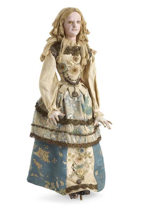 Appraisal: An th century English wooden doll of a young girl