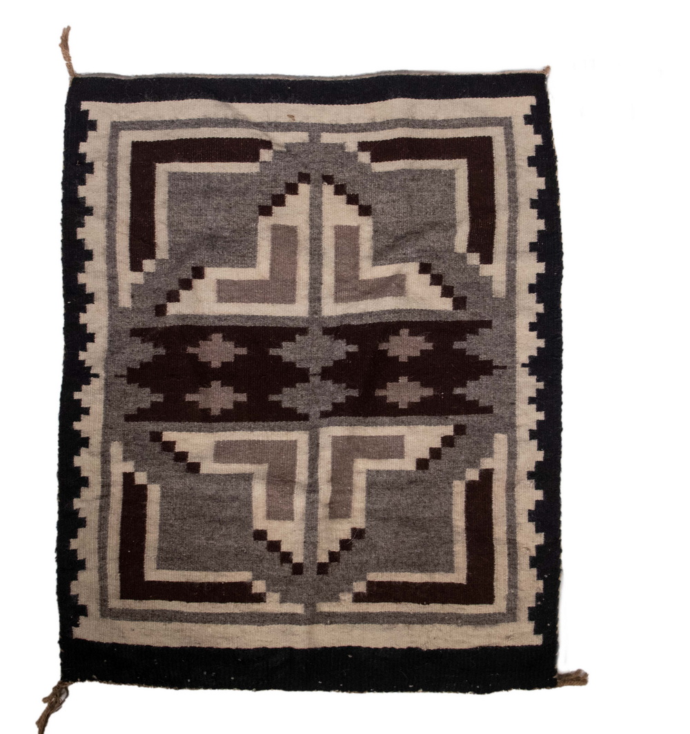 Appraisal: NAVAJO RUG Small Mat in geometric oatmeal red-brown and black