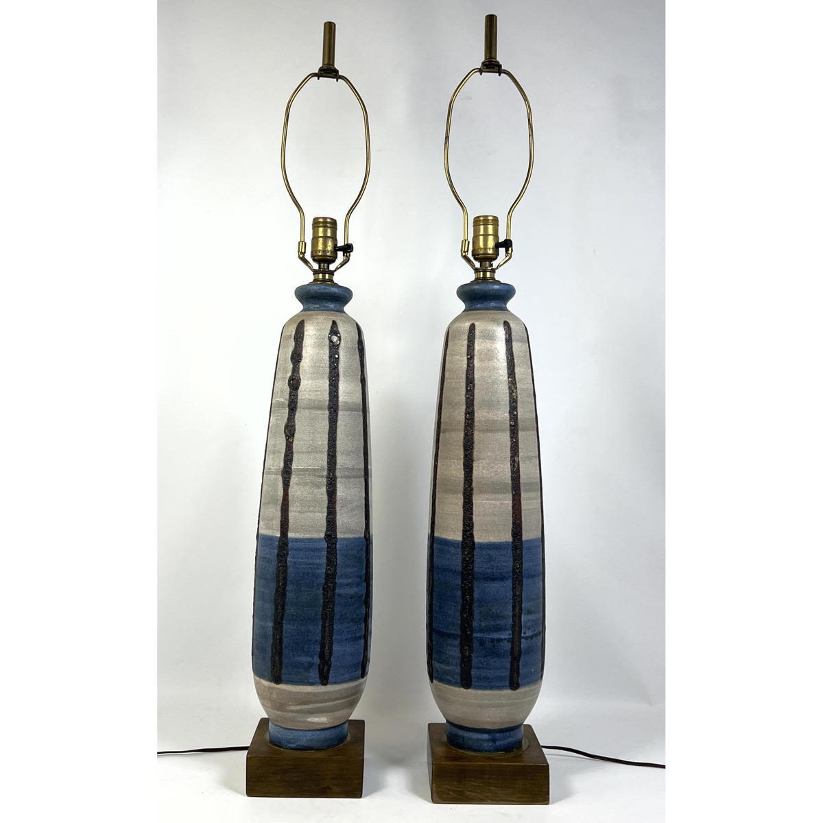 Appraisal: Pr Tall Glazed Pottery Table Lamps Modernist Blue glazed band