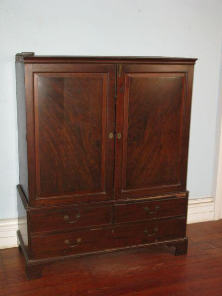 Appraisal: English Clothes Press th c mahogany mahogany veneers oak secondary