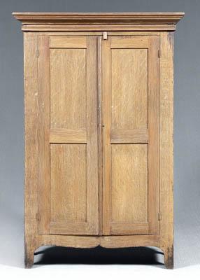 Appraisal: Grain painted South Carolina wardrobe yellow pine throughout two paneled