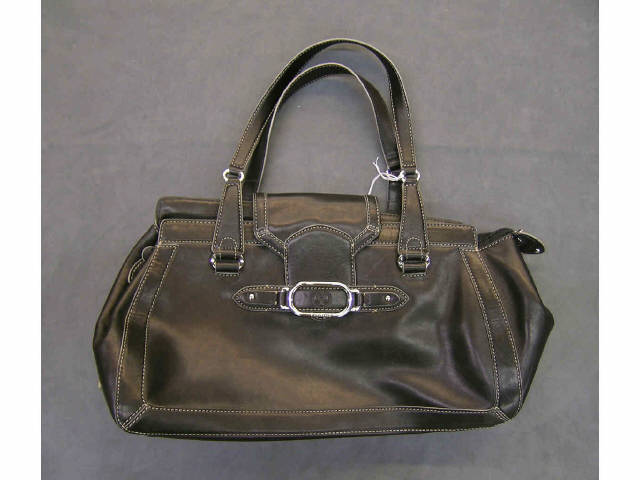 Appraisal: Cole Haan black leather handbag with zipper and tuck flap