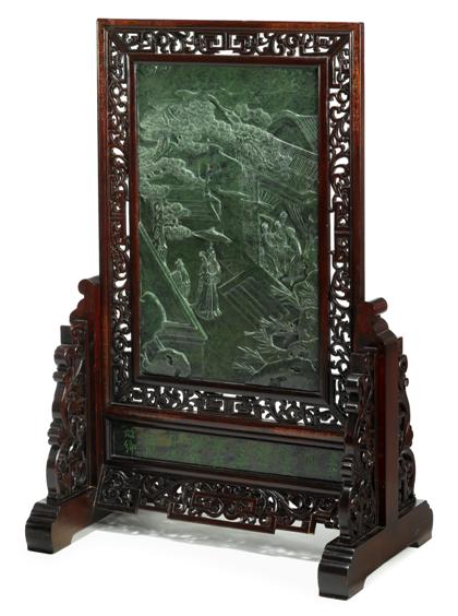 Appraisal: Massive Chinese carved spinach jade table screenThe fret-carved wood frame