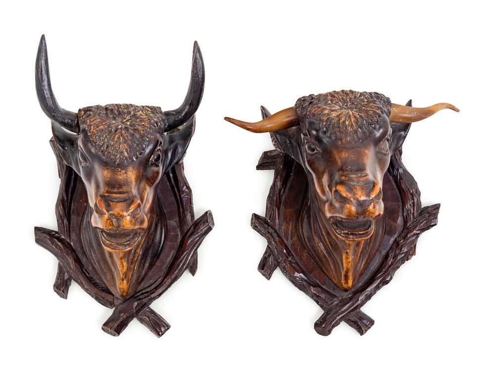 Appraisal: A Pair of Black Forest Carved Wood Bull Wall Mounts