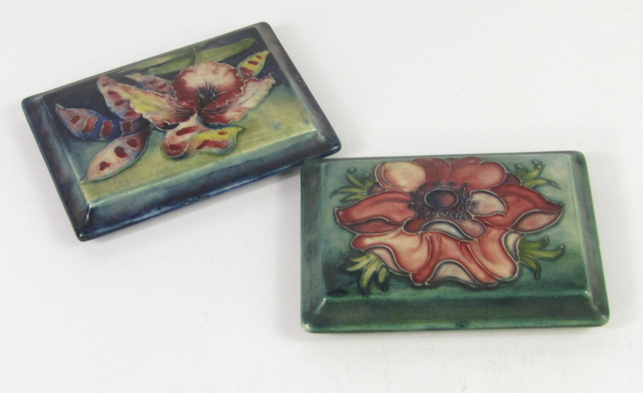 Appraisal: Two Moorcroft pottery lids rectangular decorated in the Frilled and