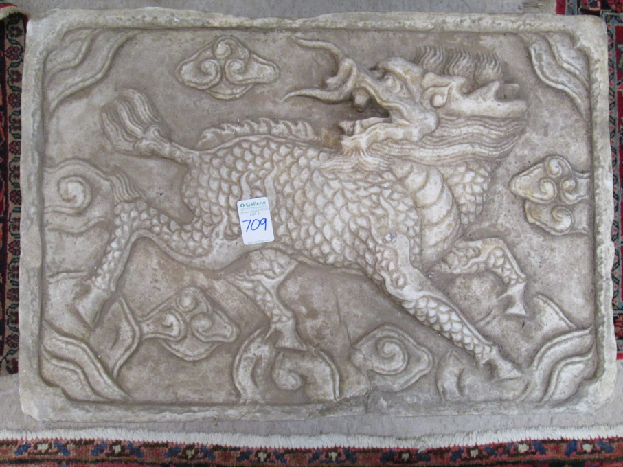 Appraisal: CHINESE MARBLE QILIN TEMPLE SCULPTURE a rectangular monolith featuring a