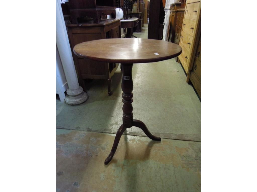 Appraisal: A Victorian mahogany snap top occasional table of oval form