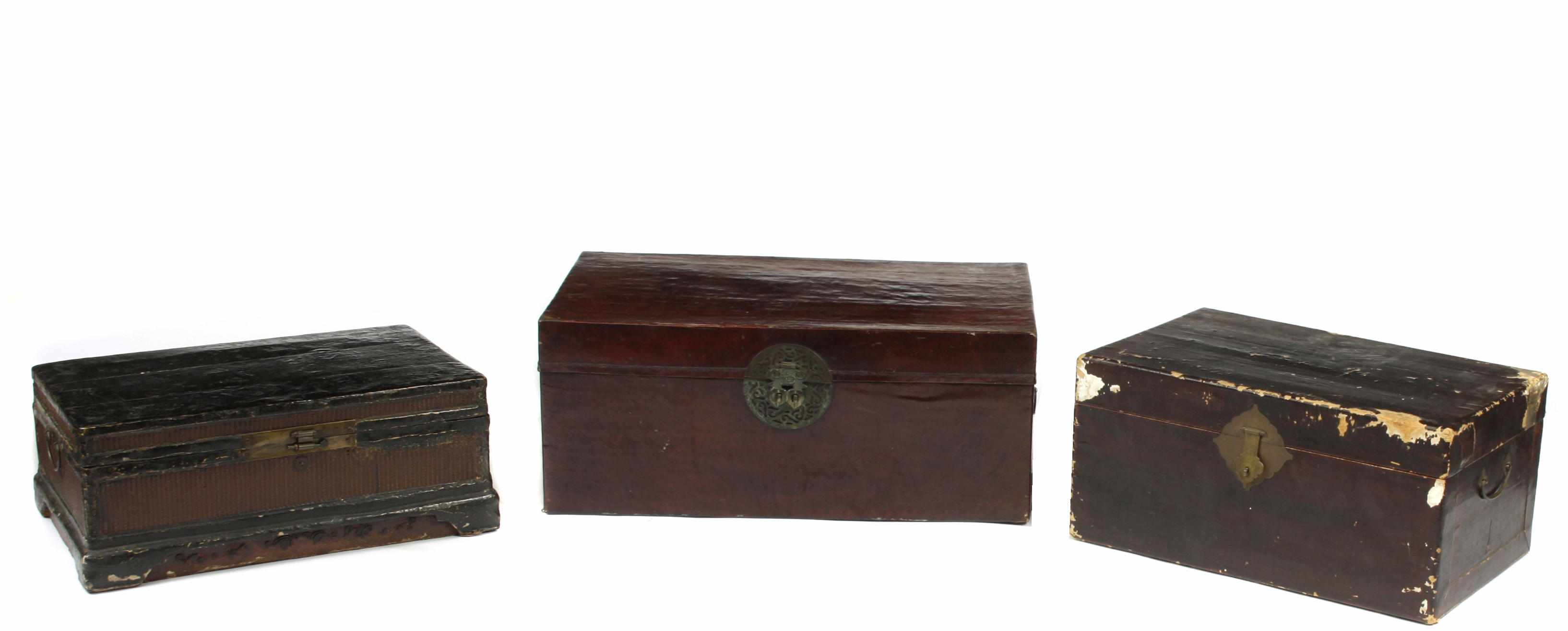 Appraisal: A group of two Chinese ebonized trunks together with a