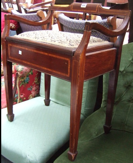 Appraisal: An Edwardian mahogany dressing stool with hinged seat