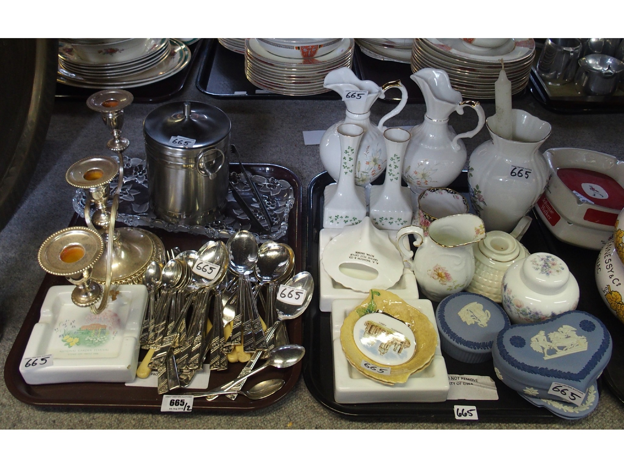 Appraisal: Two trays comprising silverplated flatware set three-light candelabra ice bucket