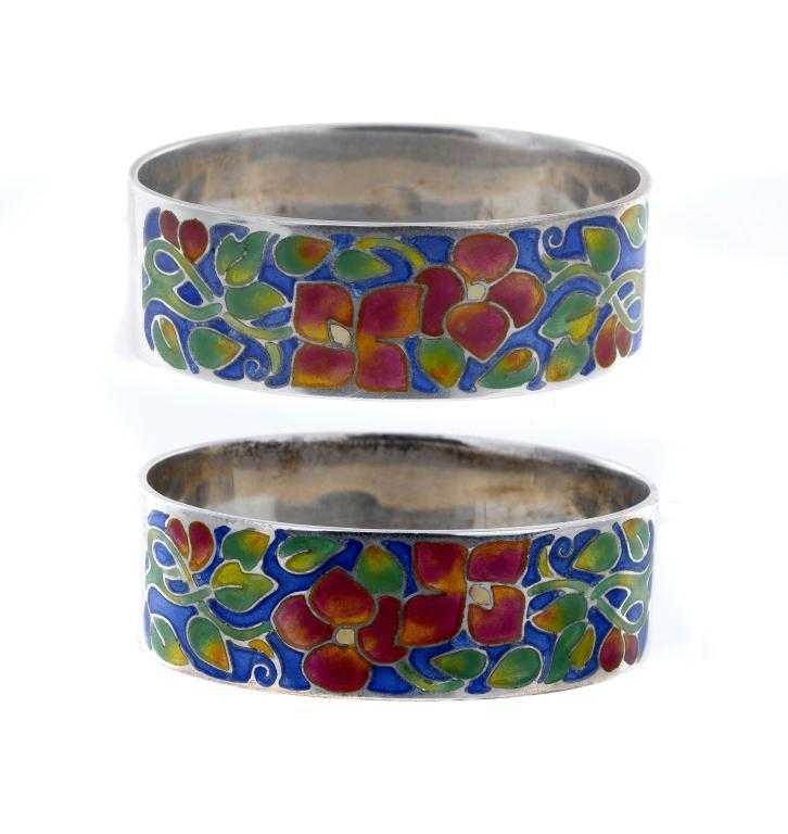 Appraisal: A PAIR OF BERNARD INSTONE SILVER AND CLOISONN ENAMEL NAPKIN