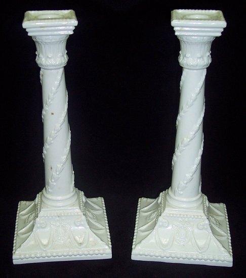 Appraisal: A pair of Royal Worcester candlesticks the Corinthian columns with