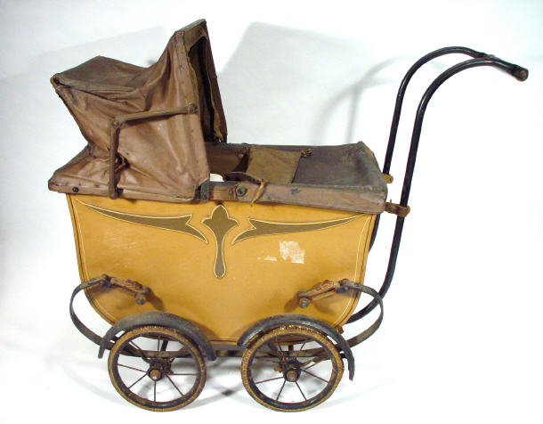 Appraisal: Edwardian child's dolls' pram with leather collapsible hood on a