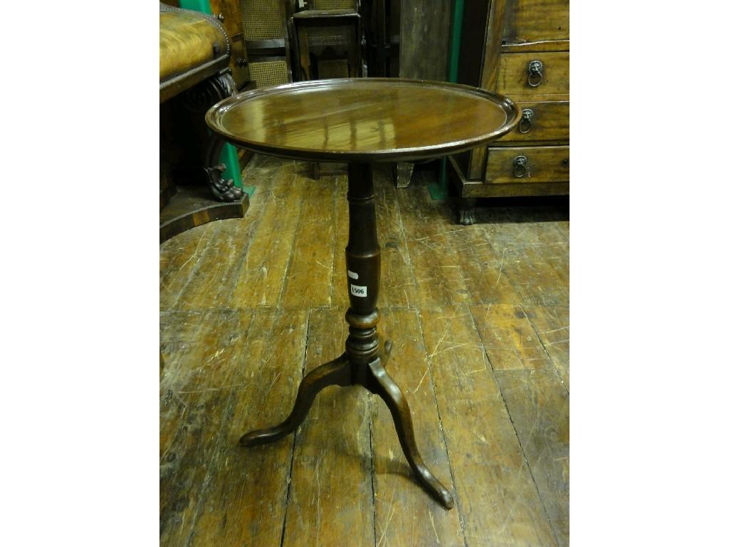 Appraisal: A th century mahogany snap top occasional table the associated