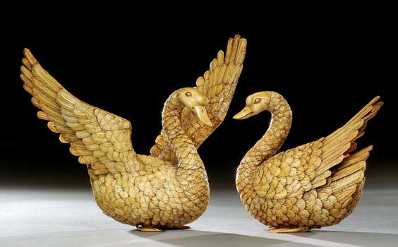 Appraisal: PAIR IVORY GEESE Pair well detailed Chinese carved sectional ivory