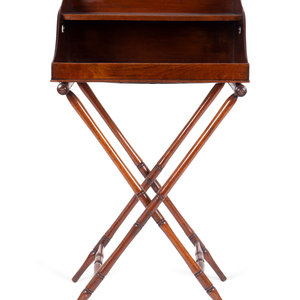 Appraisal: An English Mahogany Butler's Stand TH CENTURY with a two-tier