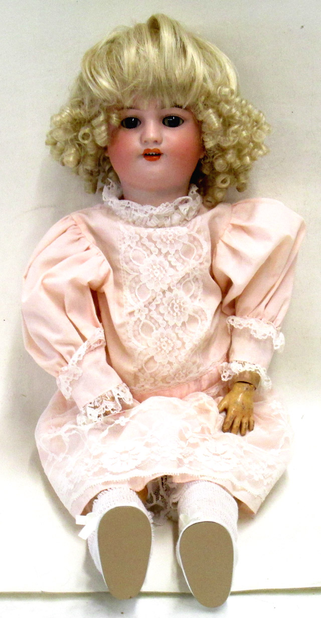 Appraisal: SIMON HALBIG BISQUE HEAD DOLL having curly blond wig bisque