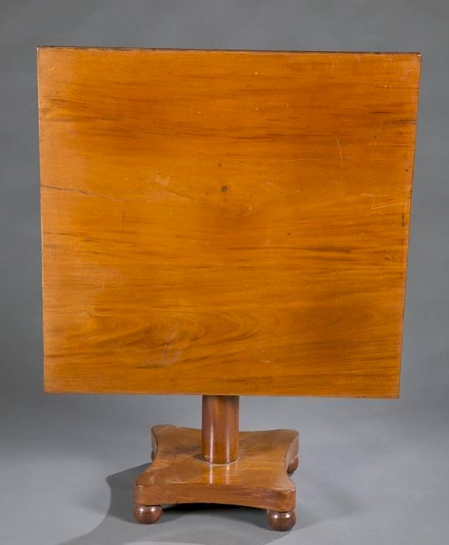 Appraisal: Hard wood tilt-top table A hardwood tilt-top table th century