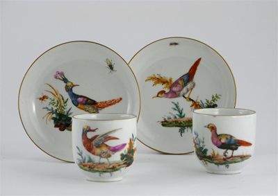 Appraisal: A good pair of Meissen cups and saucers painted with