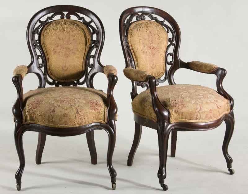 Appraisal: Pair Rococo Revival Laminated Arm Chairs circa mahogany and mahogany