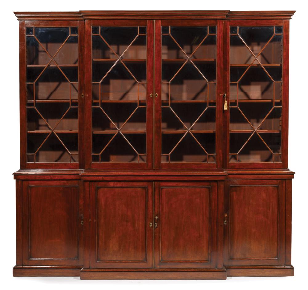 Appraisal: Antique Georgian-Style Mahogany Breakfront molded cornice four glazed doors shelf